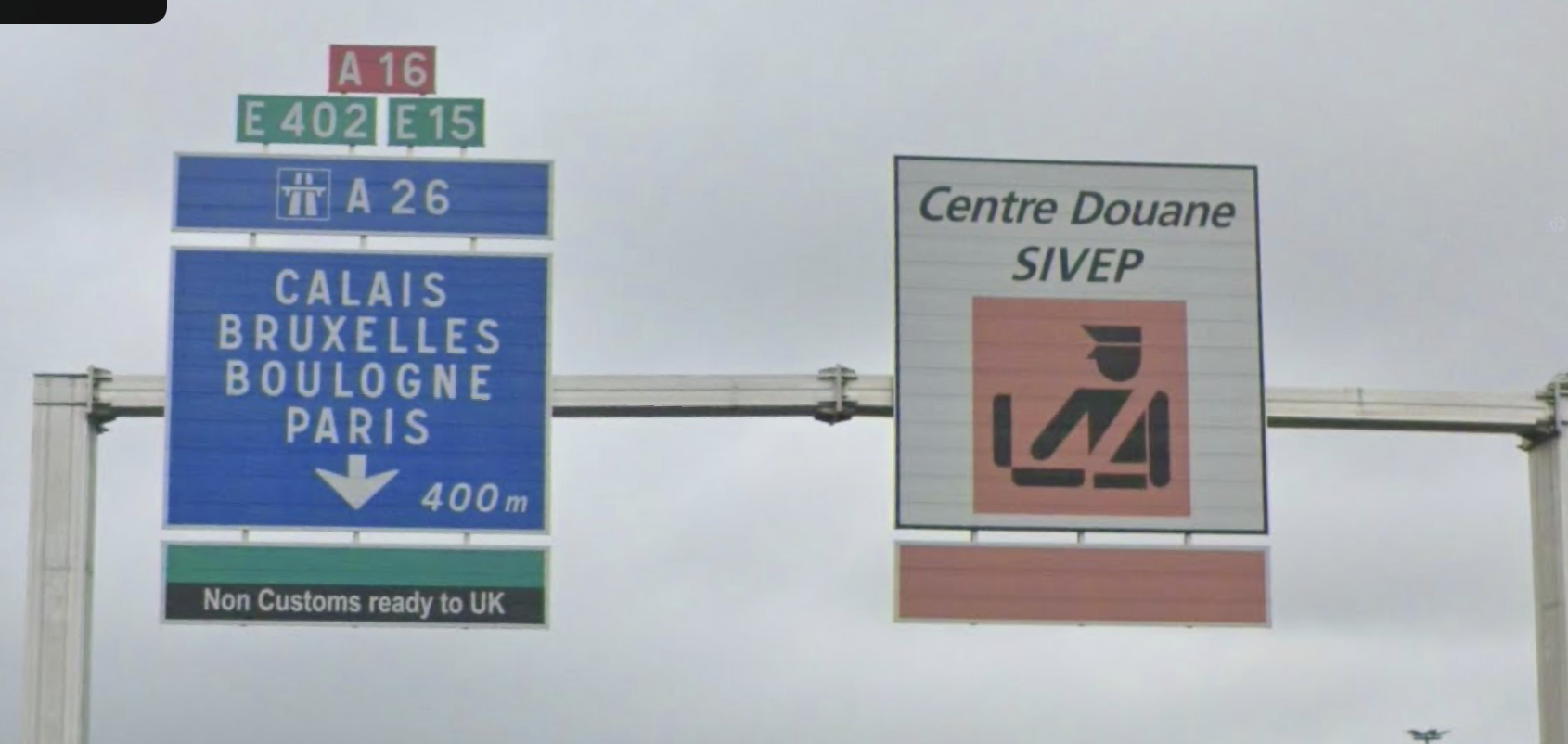 Roadsign in two parts, with right hand part clearly showing 'Centre Douane'
