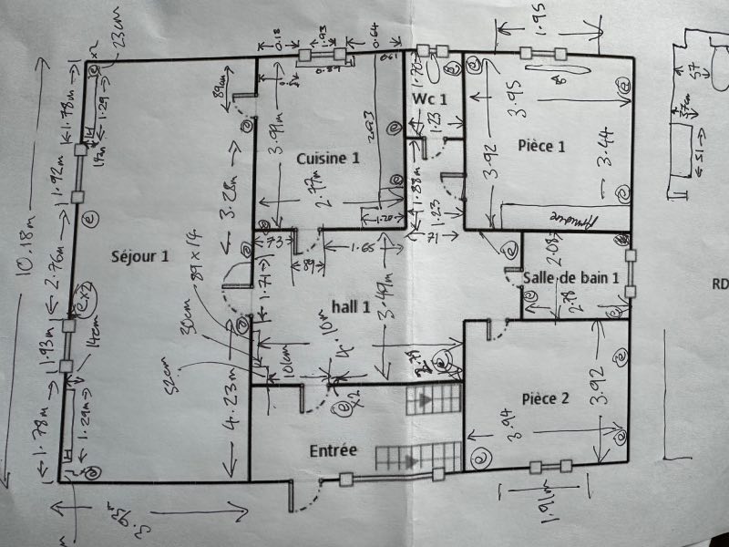 hand-written measurements on a floorplan