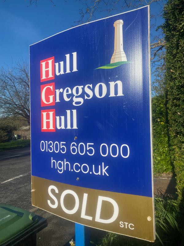 A For Sale sign showing 'Sold'